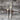 Two silver forks on a wooden surface