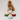 A brown cocker spaniel dog sits behind four ceramic pet bowls on a light gray studio background. The bowls are cream, green with white polka dots, red with white stars, and light blue with white hearts, each printed with a pet name.